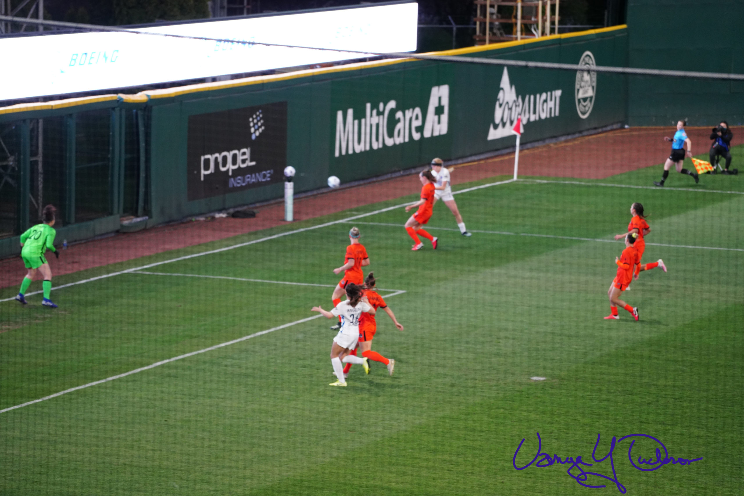 Bethany Balcer crosses from the end line
