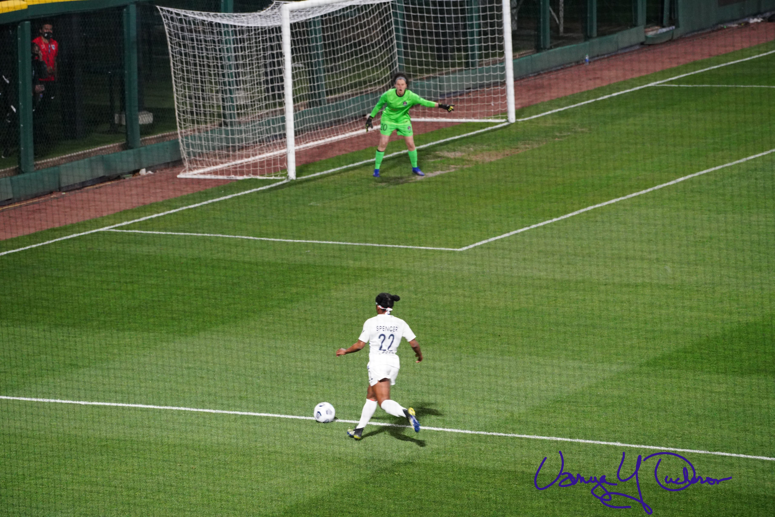 Jasmine Spencer looks to shoot or cross
