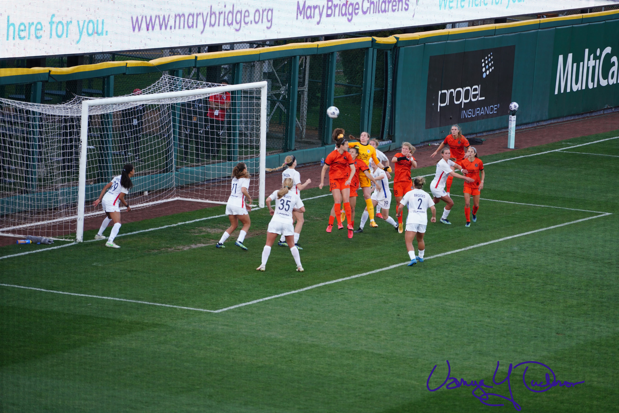 Karen Bardsley rises to punch clear on a Dash corner