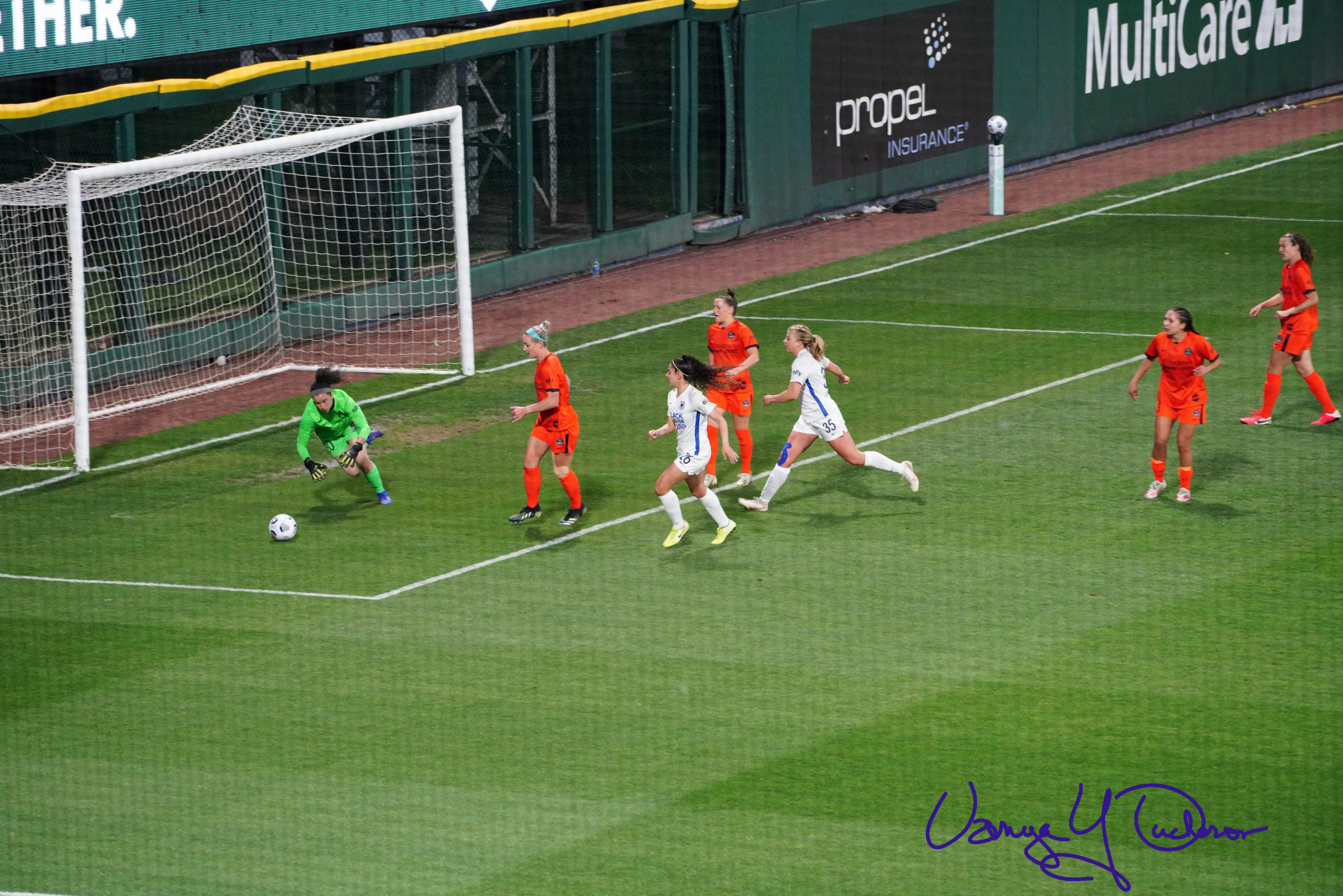 Lindsey Harris dives onto the loose ball