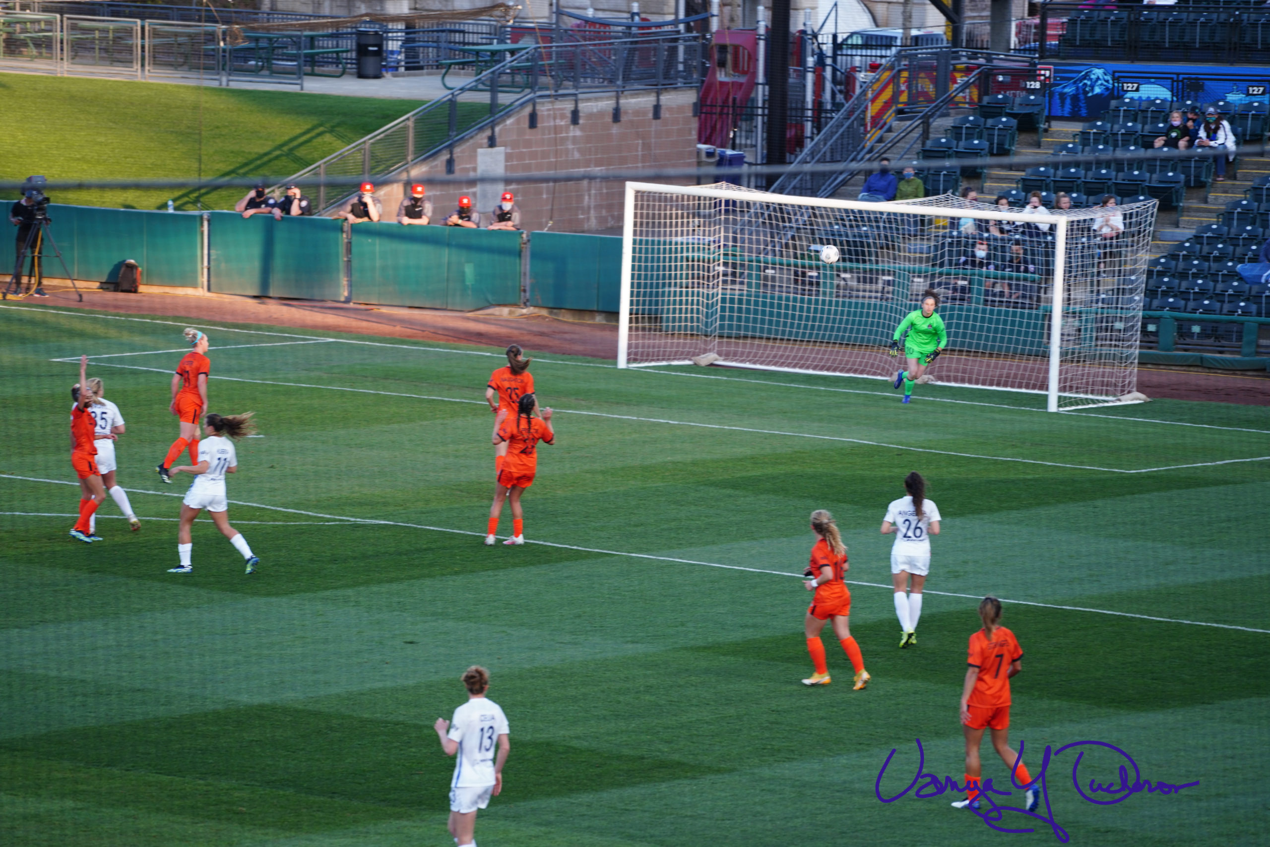 Lindsey Harris reacts to save the Leah Pruitt shot